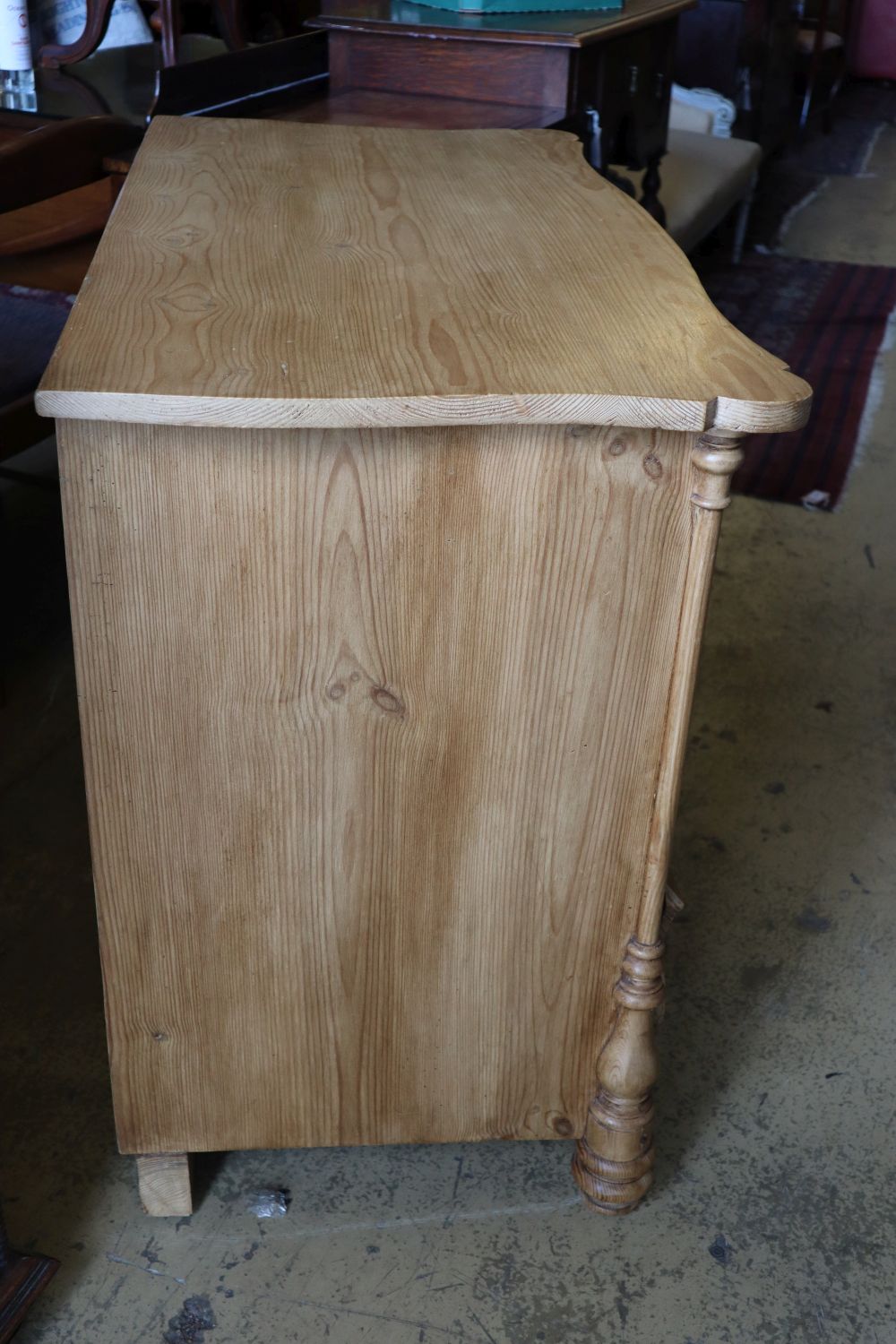 A late 19th century Continental stripped pine chest of three drawers, width 106cm depth 53cm height 81cm